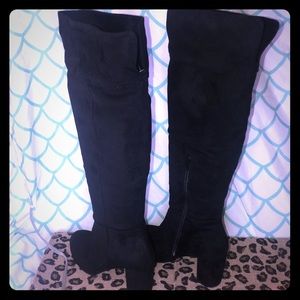 Knee high heeled boots